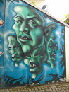 Green Faces Mural