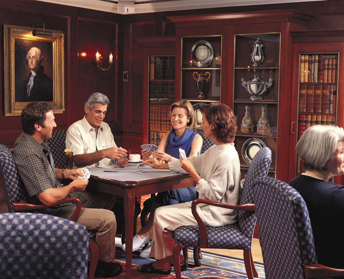 Oceania-Game-room-1 - Challenge your fellow passengers to a friendly game of cards in the Game Room during your cruise on Oceania Regatta.