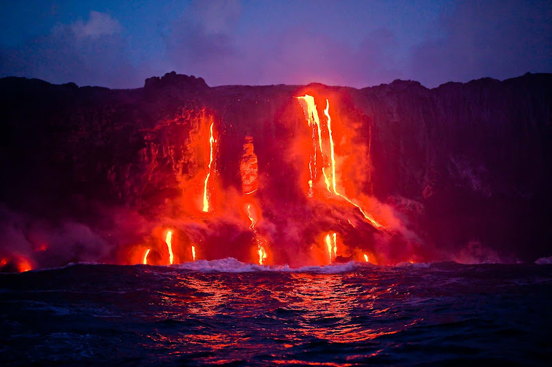 Hot magma flows into the Pacific from a volcanic eruption on the Big Island of Hawaii.