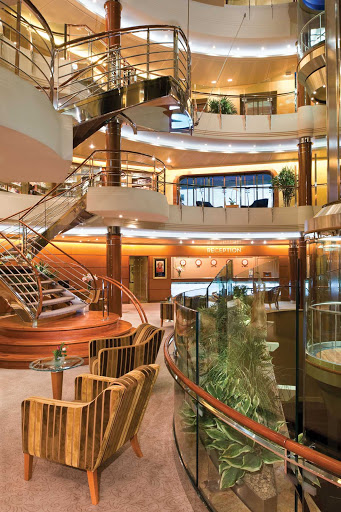 You will appreciate the contemporary, elegant interiors, including the Atrium shown here, as you explore Seven Seas Mariner.