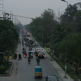 Going Home by Amir Hameed - Transportation Roads