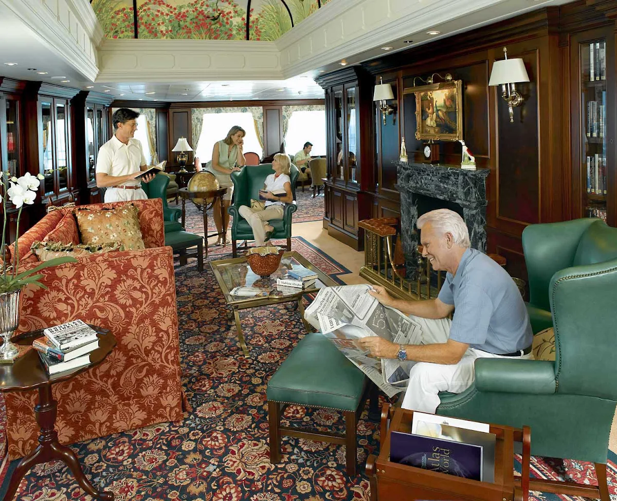 Oceania-Library-3 - During your cruise on Oceania Nautica, kick back and catch up on your reading in the ship's Library.
