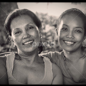 Mother and Daughter by Paul Agraviador - Black & White Portraits & People