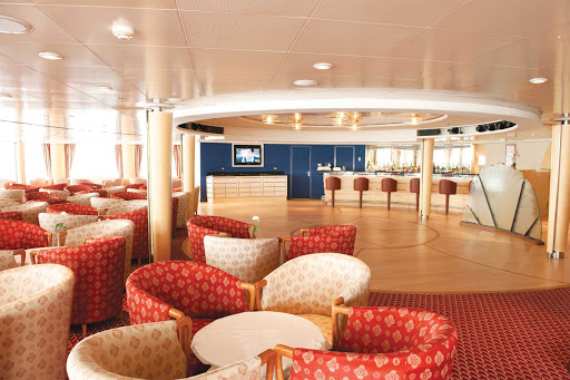Silversea_Panorama_Lounge_2 - The Panorama Lounge is an ideal place to unwind, relax, enjoy complimentary drinks and listen to the ship's pianist.