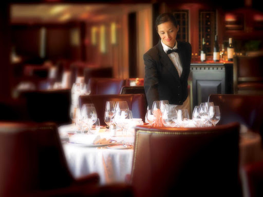 Indulge in the traditional, handsome dining room of Oceania Regatta's Polo Grill.