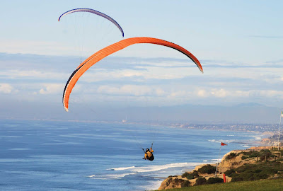 Parakiting over Torrey Pines near San Diego, California.
