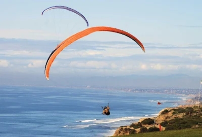 Parakiting over Torrey Pines near San Diego, California.