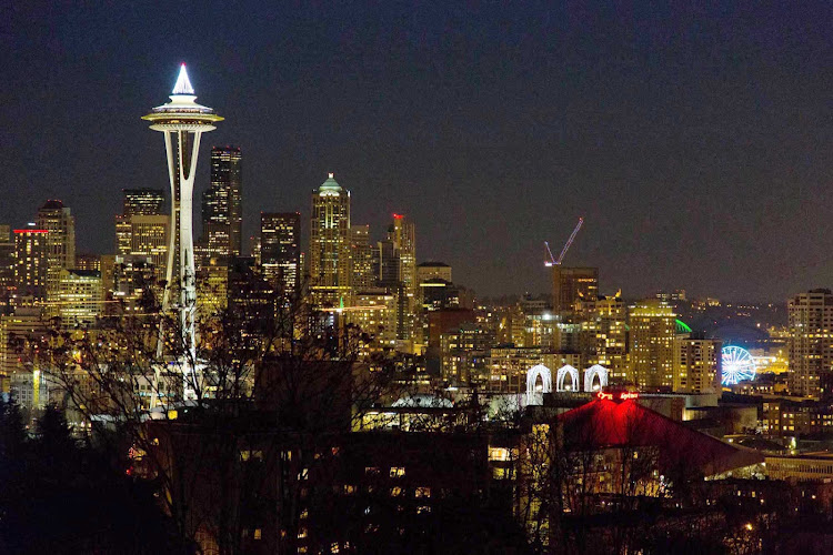 A nighttime view of the Seattle skyline. 