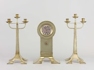 Mantle clock with two candelabra