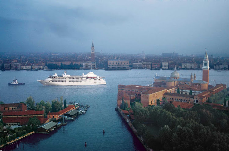 Silver Cloud sails past historic St. Mark's Square, Venice.