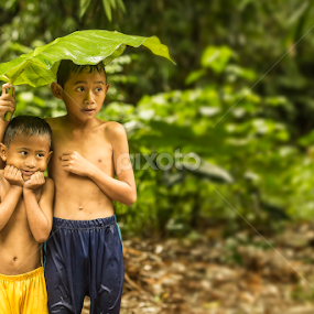 under the umbrella of leaf by Aad S. Ahmad - Babies & Children Children Candids