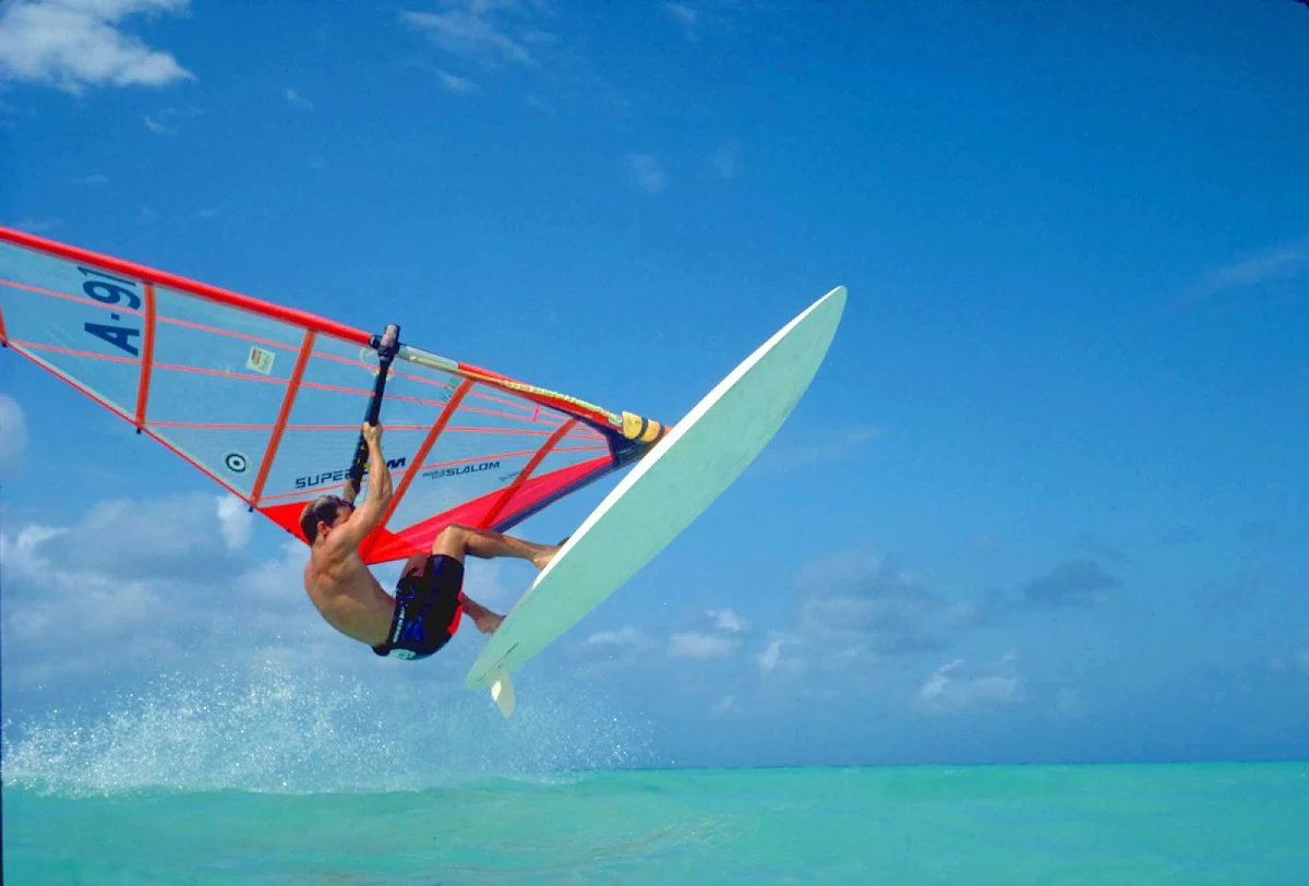 Aruba-windsurfing2 - An experienced windsurfer catches some air on Aruba.