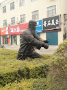 Old Man Statue