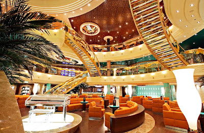 The soaring atrium of MSC Fantasia features staircases studded with Swarovski crystals.