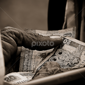 Is it all about the money by Sandun Lakmal - People Body Parts