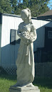 Lady With Grapes Statue
