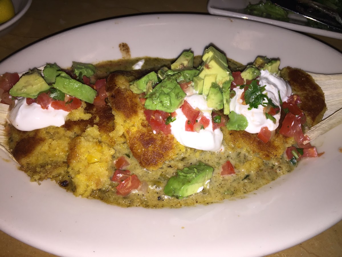 Sweet corn tamale cakes with avocado, creme fraiche, and salsa. Delicious!!
