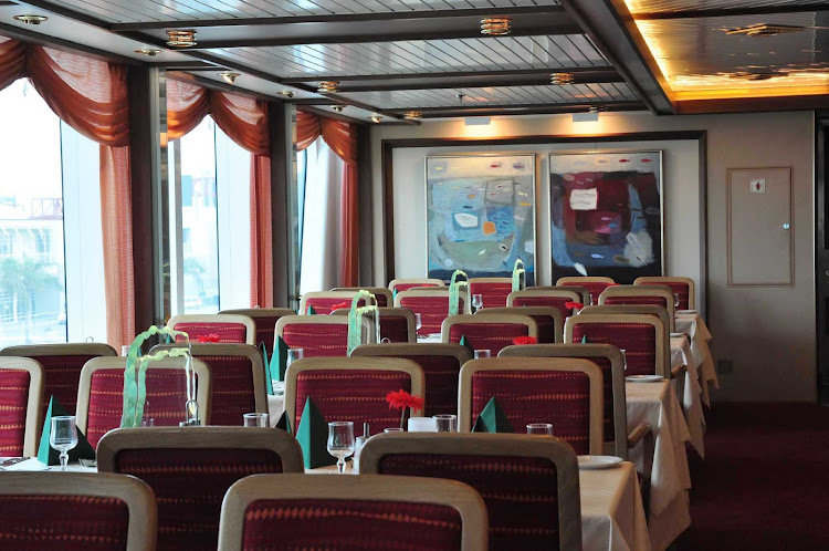You'll enjoy the view of your travels and meet interesting new people as you dine aboard Hurtigruten's flagship, the ms Fram.