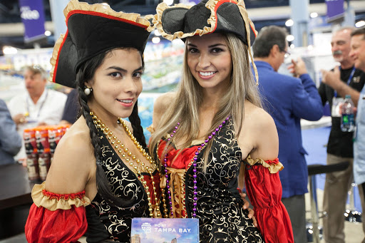 Two of the Tampa Bay Buccaneers our team met at Cruise Shipping Miami in March 2014. We liked the people there, but didn't like having to ship home two 50-pound boxes of very analog brochures.