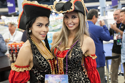 Two of the Tampa Bay Buccaneers our team met at Cruise Shipping Miami in March 2014. We liked the people there, but didn't like having to ship home two 50-pound boxes of very analog brochures.