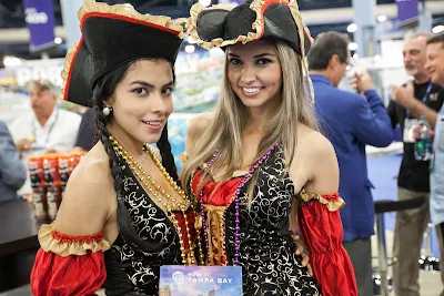 Two of the Tampa Bay Buccaneers our team met at Cruise Shipping Miami in March 2014. We liked the people there, but didn't like having to ship home two 50-pound boxes of very analog brochures.