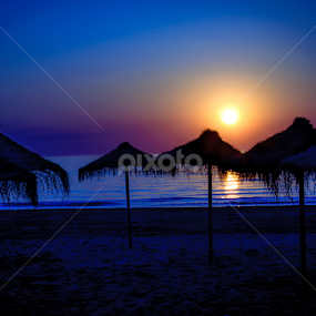 Blue Sunset by RaeLynn Petrovich - Landscapes Beaches
