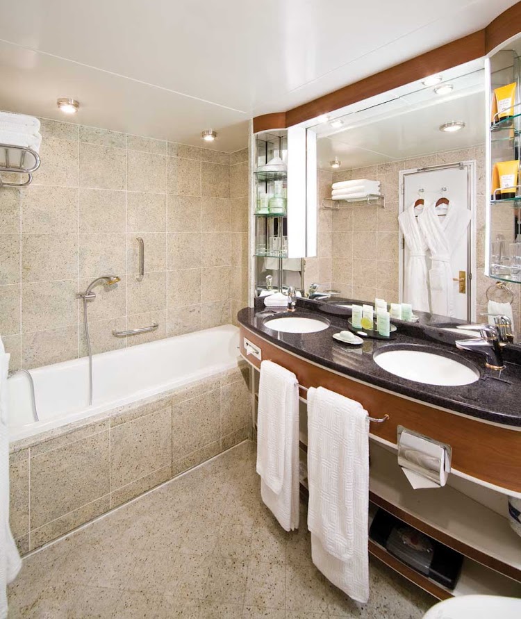 Press your toes against the fine marble in the Veranda Suite bathroom aboard Silver Whisper, equipped with a full size bath and separate tub.