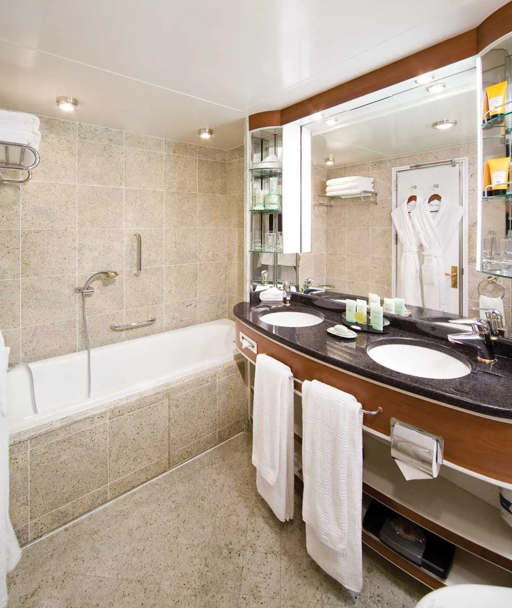 Silversea_Veranda_Suite_bathroom-1 - Press your toes against the fine marble in the Veranda Suite bathroom aboard Silver Whisper, equipped with a full size bath and separate tub.
