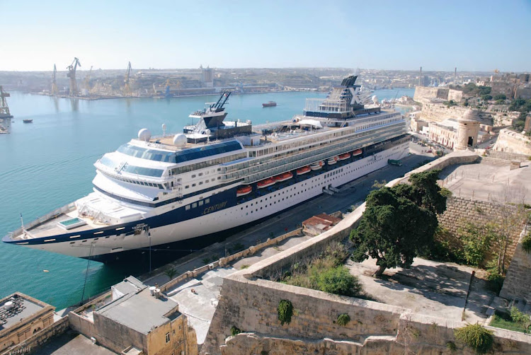 Celebrity Century docked at the port of Malta’s capital, Valletta, while guests enjoy the magical city.
