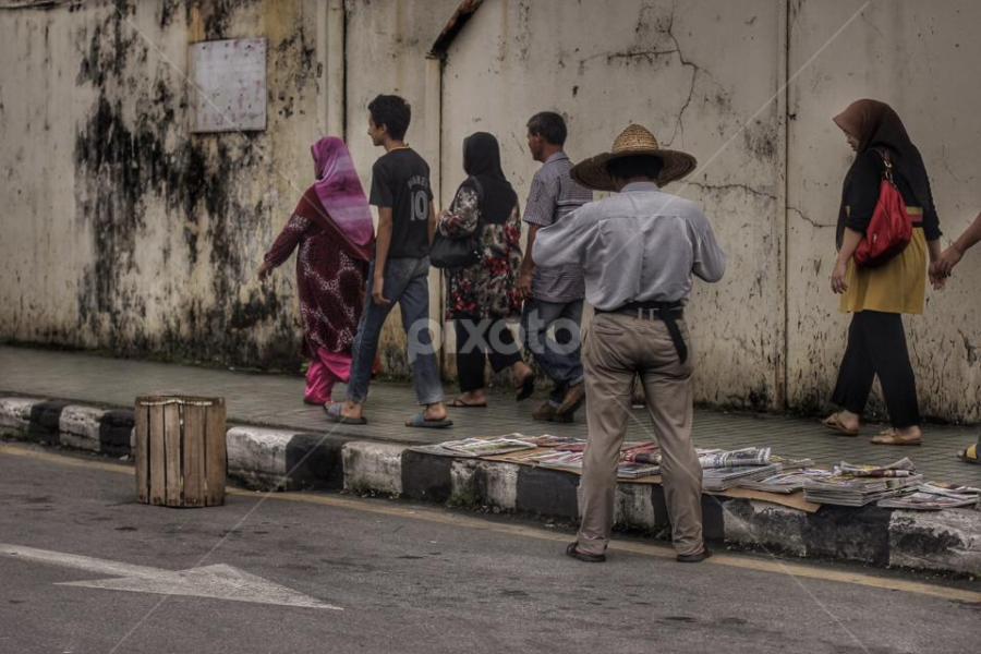 News paper man by Mohammad Bujang - City,  Street & Park Street Scenes