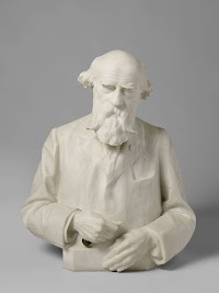 Buste van Dr. Petrus Josephus Hubertus Cuypers (1827-1921), architect met bijbehorende rechthoekige sokkel van zwart graniet met grijs mica