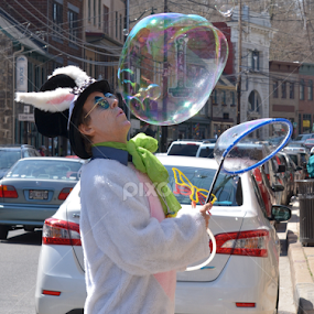 Bunny Blowing Bubbles by June Morris - People Street & Candids
