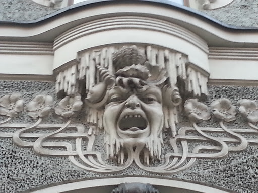 Screaming Face Over Gate