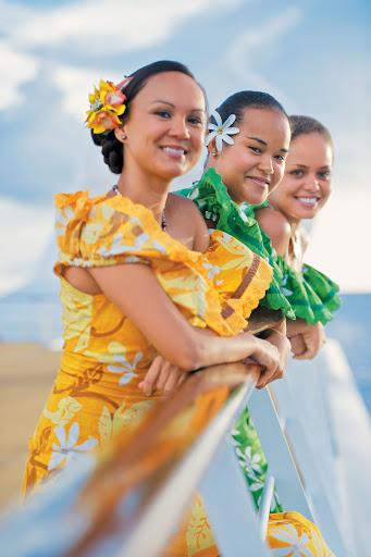 Gauguines_TMK - Take in a show in the Paul Gauguin's Le Grand Salon or on pool deck and learn how to dance in true Polynesian style.
