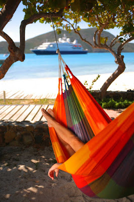 Want to relax? Sling yourself into a hammock during your SeaDream shore excursion.