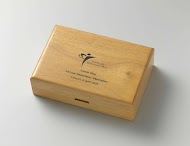 Houten doosje bij munt 400 jaar Nederland-Manhattan