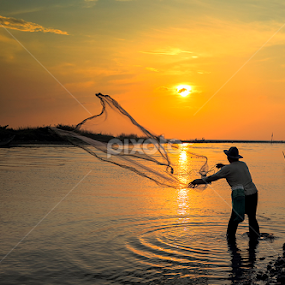 Throwing Nets by I Ketut  Sadia - Landscapes Sunsets & Sunrises