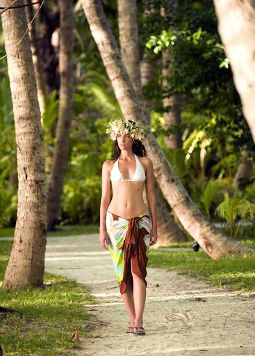 Vahine-Walking-Through-Coconut-Grove-BoraBora - Walk through coconut groves and experience the tranquility of Bora Bora.