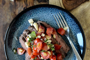 Red Wine Marinated Flank Steak with Cherry Tomato Caprese Salsa