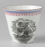 Kopje met afbeelding van geketende geknielde tot slaaf gemaakte. Nederland, ca. 1850-1900