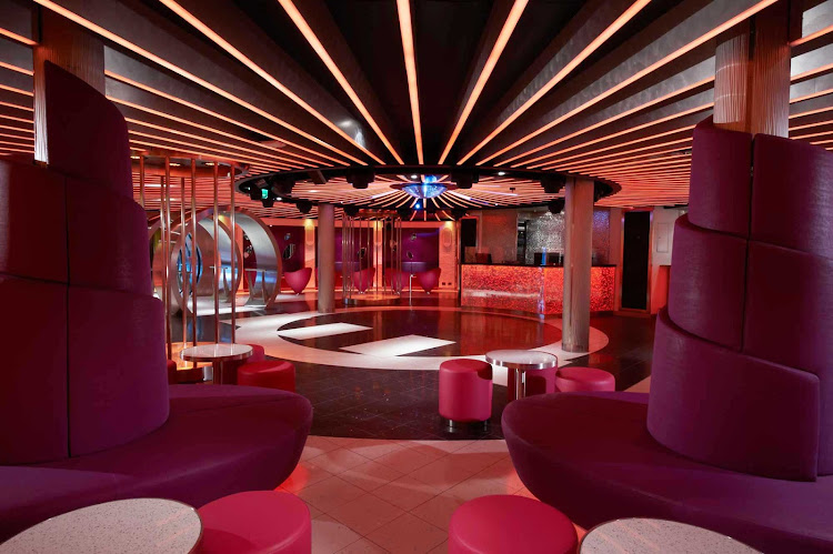 At night, head to the Liquid Lounge to grab a drink and meet new people when you sail on Carnival Breeze.