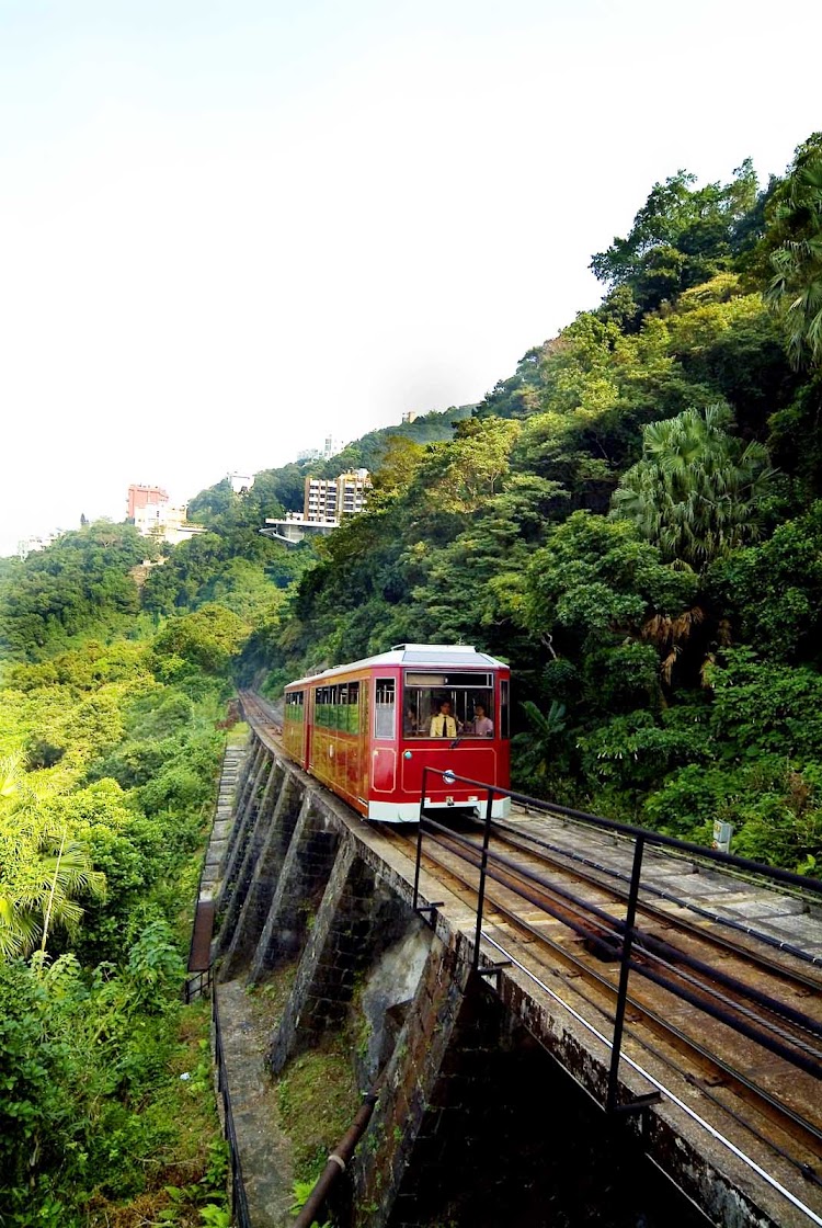 The Peak Tram on its way to Victoria Peak in Hong Kong.