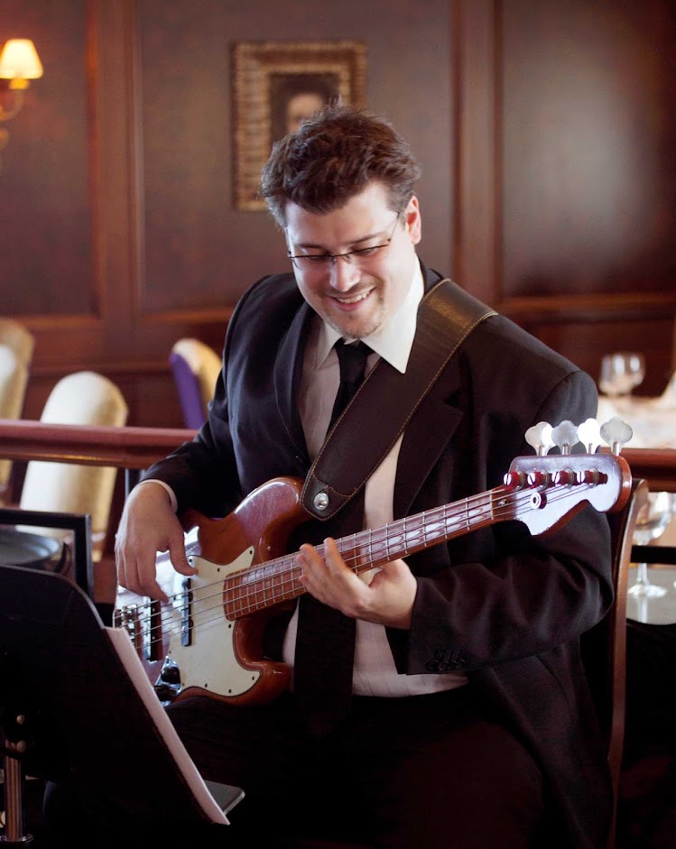 A jazz musician performs during brunch on an Azamara cruise.  