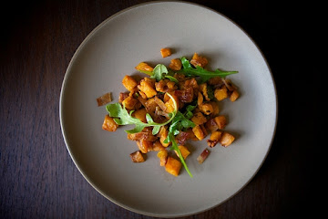 Brown Butter-Roasted Sweet Potatoes with Arugula and Bacon