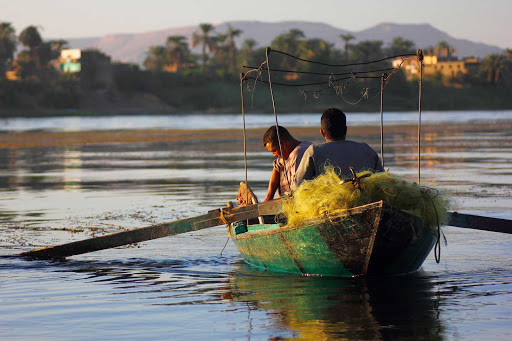 Fishermen on the Nile River in Luxor, Egypt. 