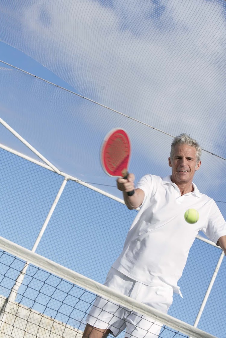 Enjoy a rousing game of paddle tennis aboard the Crystal Serenity.