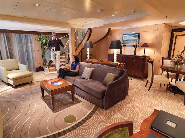 Guests who book a Duplex Suite aboard Queen Mary 2 get a comfortble, spacious living room area on the lower level.