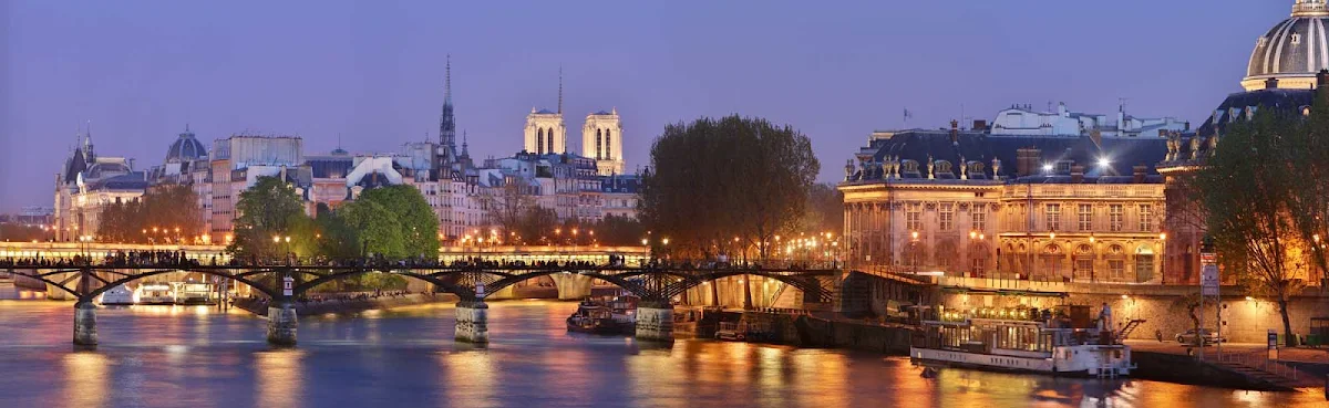 Pont-des-Arts-Paris - A wonderful evening capture of Pont des Arts, the pedestrian bridge over the River Seine in Paris. It links the Institut de France and the central square of the Louvre. You can also see Notre Dame and Sainte-Chapelle. 