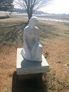 Kneeling statue
