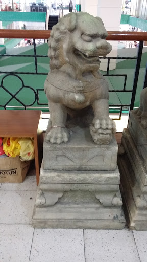 Left Lion Statue At Pearls